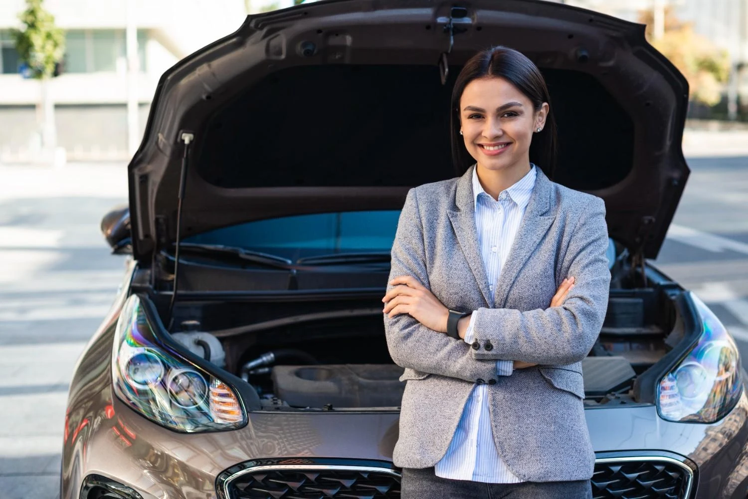 Car dealer helping customer
